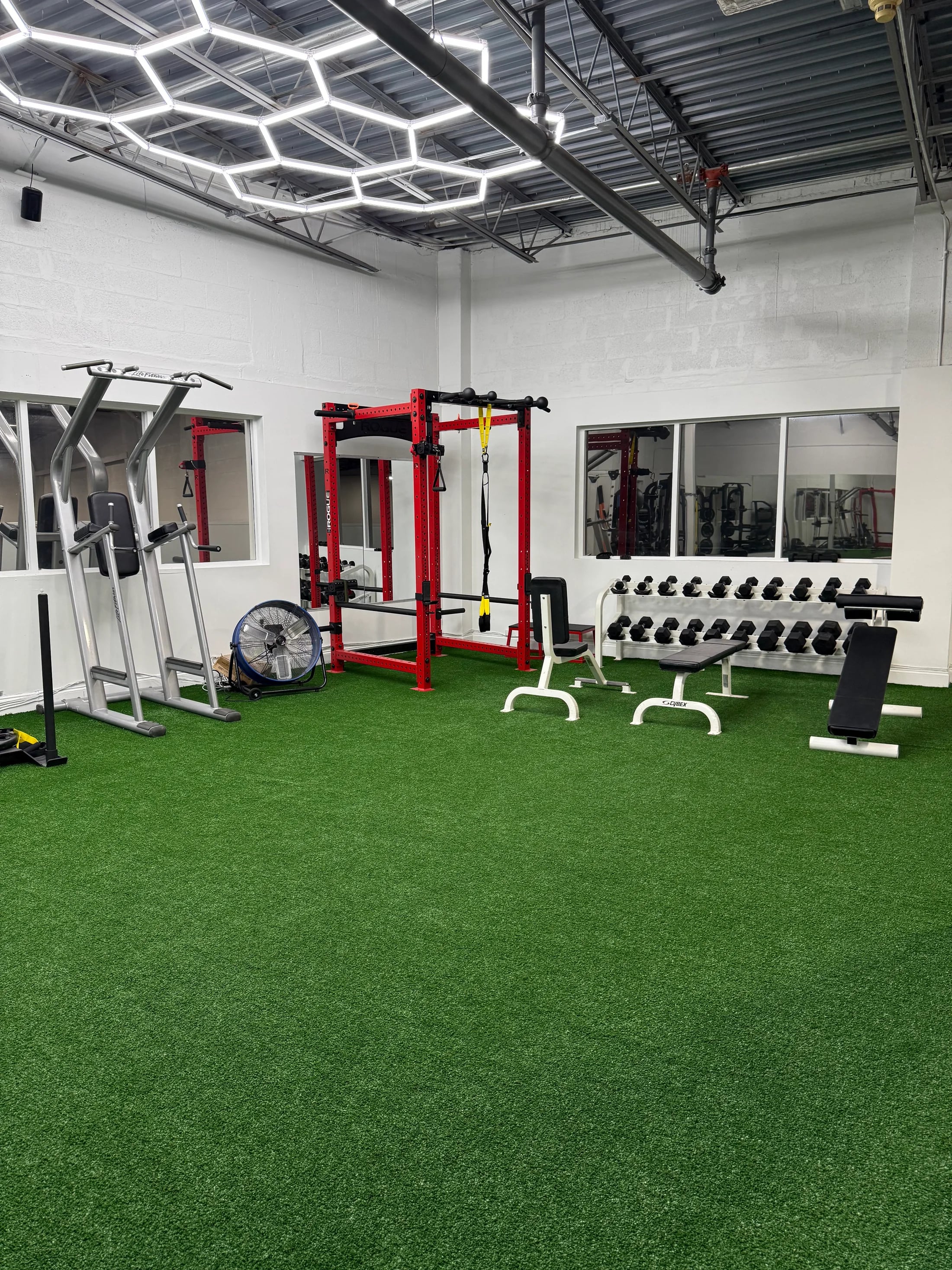 The private turf and strength training floor at The Lions Den Boca near Delray Beach
